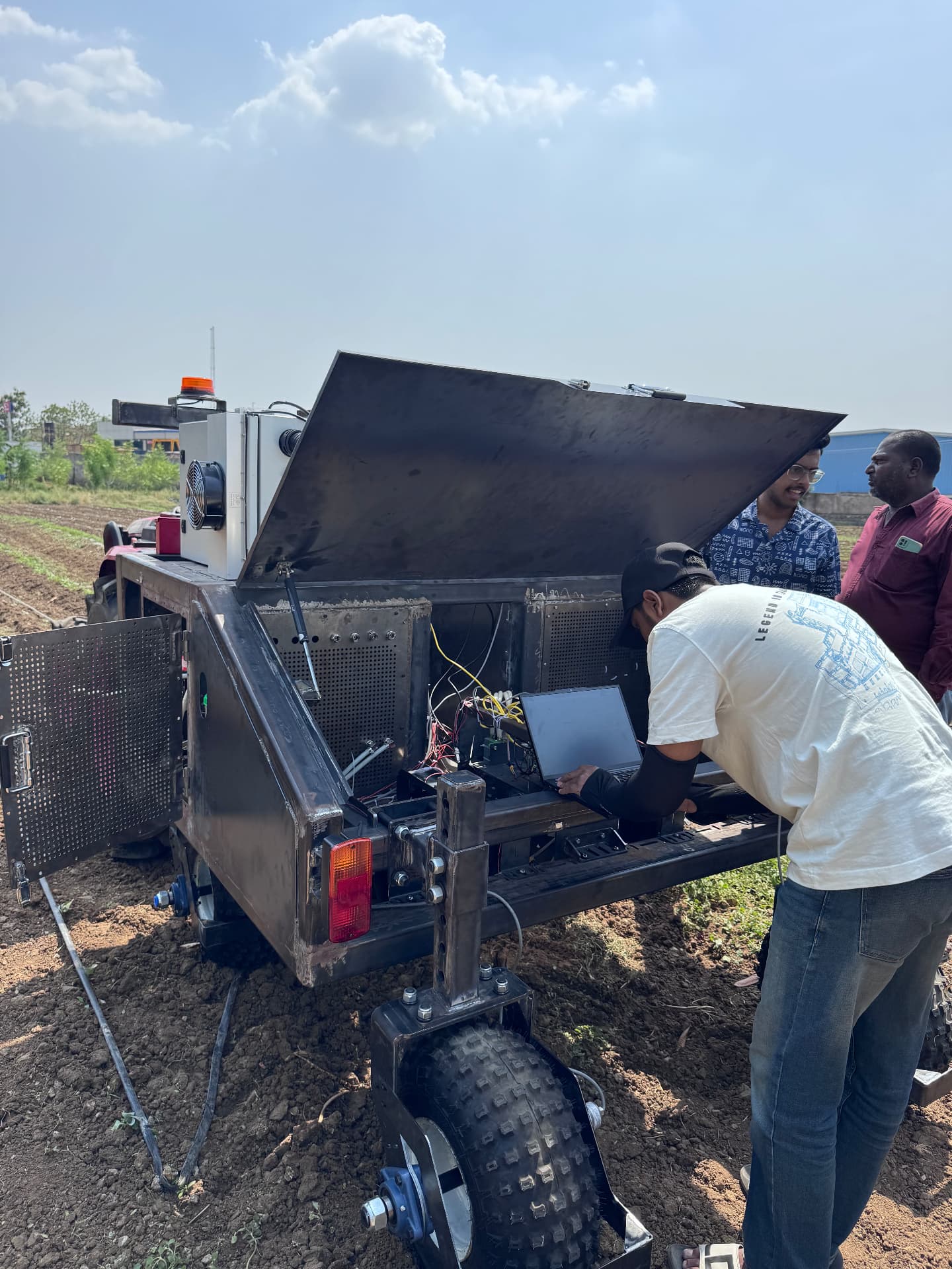 An engineer tuning the Rakshakh wiring and electronics in the field